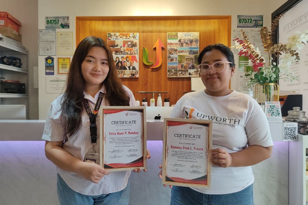 UPworth interns with their certificates of completion