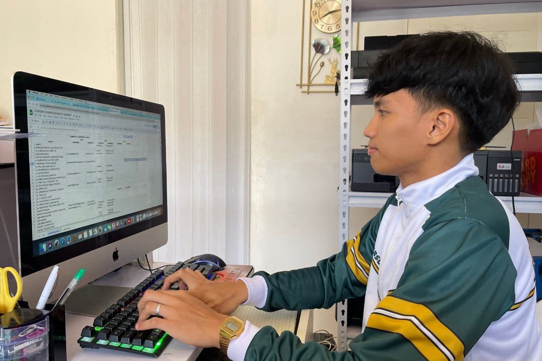A UPworth intern working on a client's books